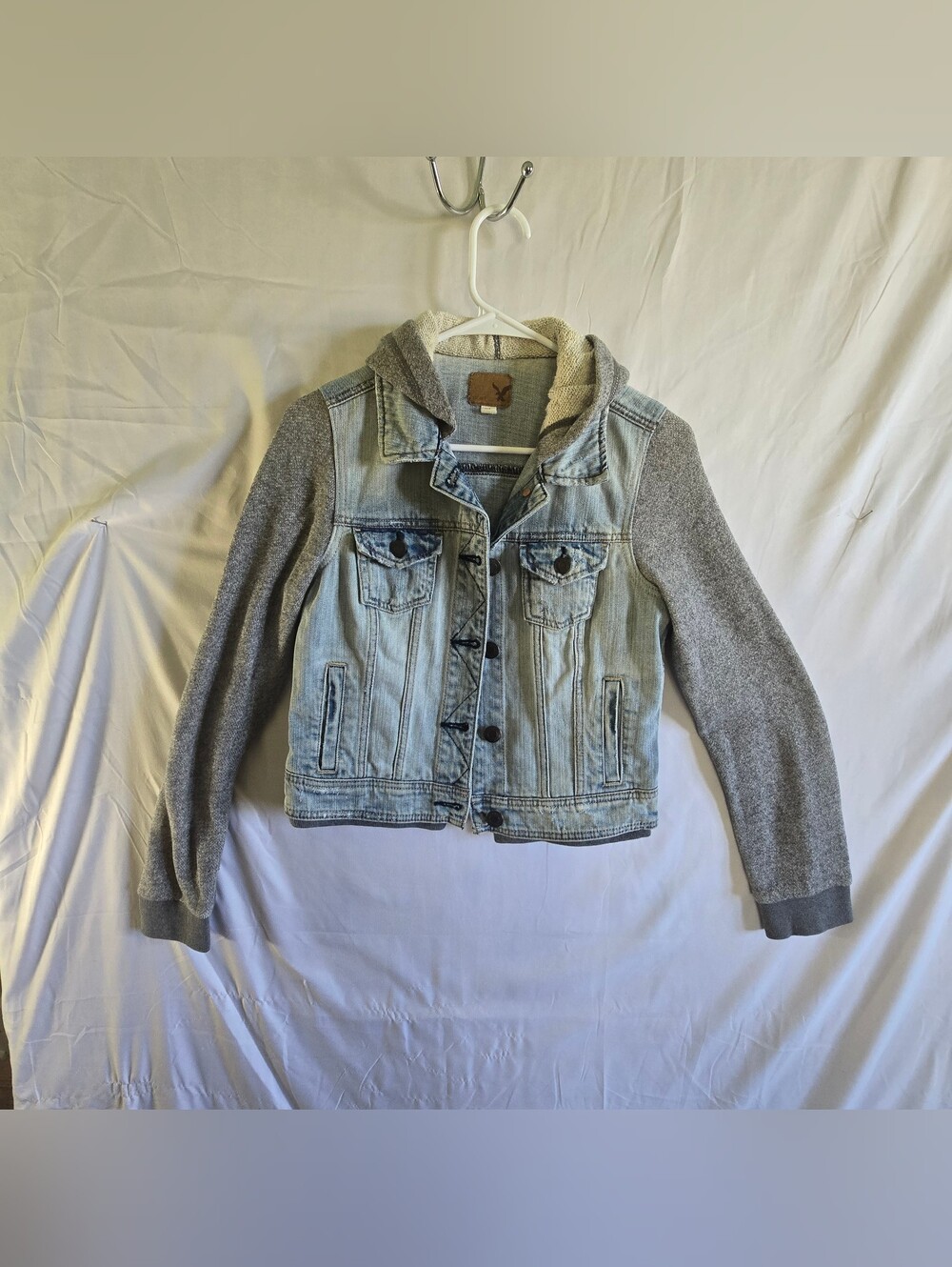 American Eagle Outfitters Light Wash Denim Jacket with Gray Knit Sleeves